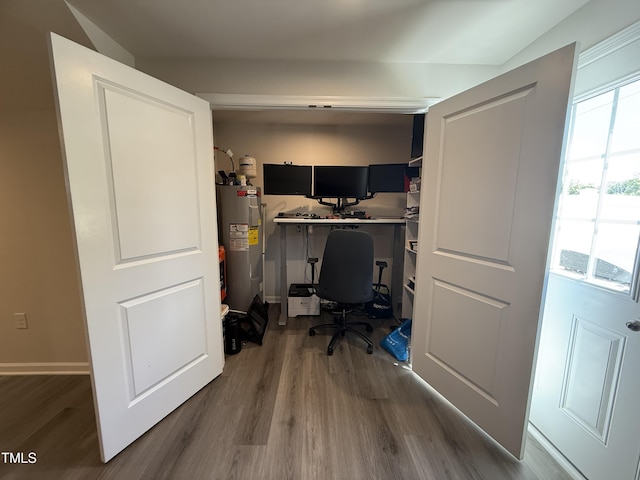 4500 Black Drum Dr, Raleigh, NC 27616 - office area with electric water heater and dark wood finished floors