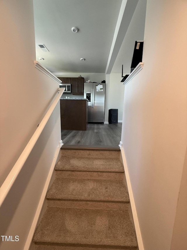 4500 Black Drum Dr, Raleigh, NC 27616 - stairs with baseboards and wood finished floors