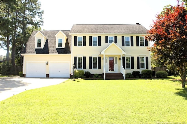 5417 Labrador Dr, Hope Mills, NC 28348 - colonial house featuring driveway and a shingled roof