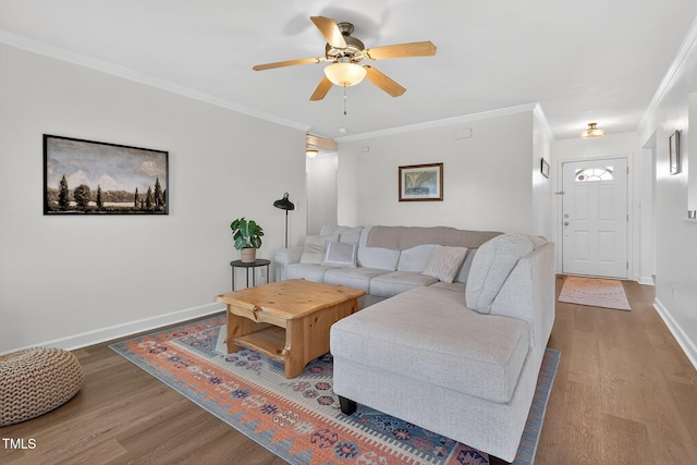 108 Hudson Dr, Princeton, NC 27569 - living room featuring wood finished floors, a ceiling fan, and ornamental molding