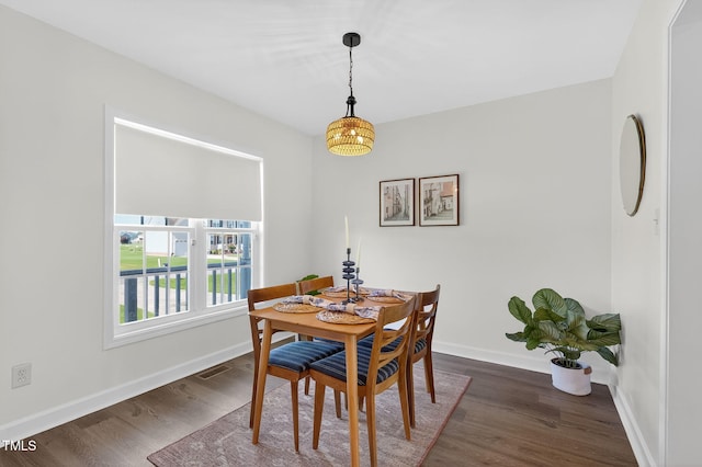 108 Hudson Dr, Princeton, NC 27569 - dining area featuring dark wood-type flooring