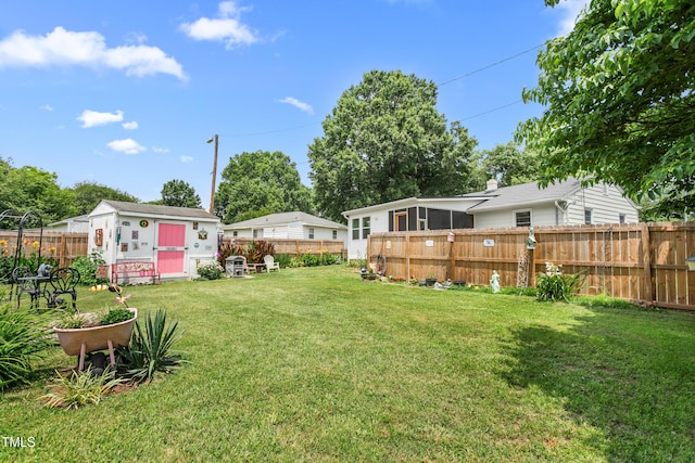 302 Bradley St, Burlington, NC 27215 - fenced backyard with a storage unit