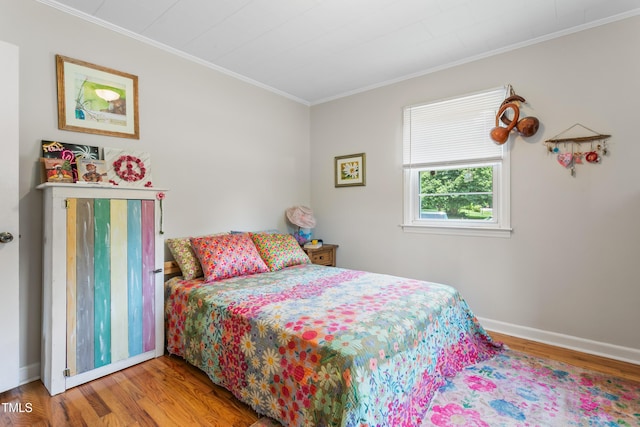 302 Bradley St, Burlington, NC 27215 - bedroom featuring crown molding and wood finished floors