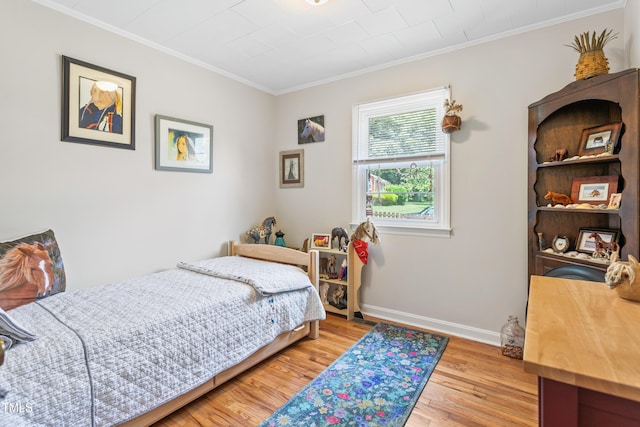 302 Bradley St, Burlington, NC 27215 - bedroom featuring wood finished floors and ornamental molding