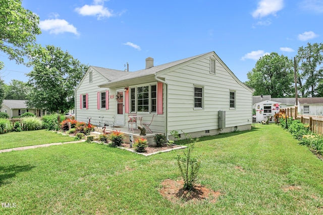 302 Bradley St, Burlington, NC 27215 - view of front of house featuring a chimney and crawl space