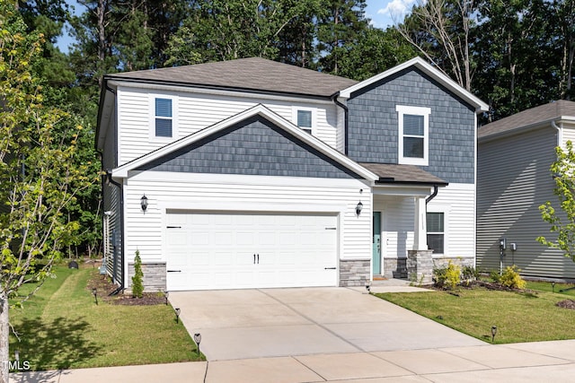 1113 Umstead Grove Way, Durham, NC 27712 - view of front facade featuring a front yard, concrete driveway, stone siding, an attached garage, and roof with shingles