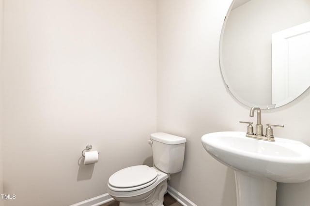 1113 Umstead Grove Way, Durham, NC 27712 - half bathroom featuring baseboards and toilet