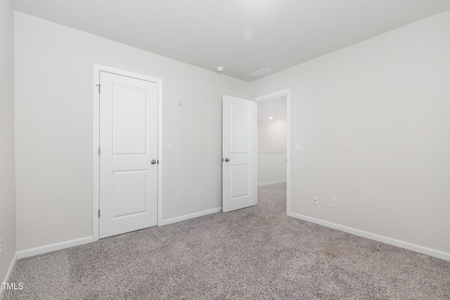 1113 Umstead Grove Way, Durham, NC 27712 - unfurnished room featuring carpet floors and a smoke detector