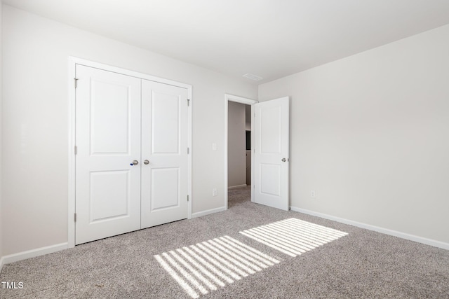 1113 Umstead Grove Way, Durham, NC 27712 - unfurnished bedroom featuring carpet and a closet