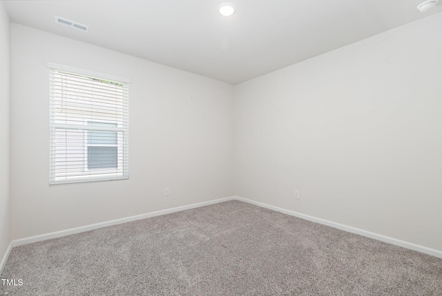 1113 Umstead Grove Way, Durham, NC 27712 - carpeted empty room featuring a smoke detector and recessed lighting