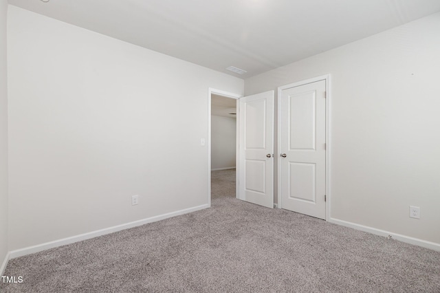 1113 Umstead Grove Way, Durham, NC 27712 - unfurnished bedroom with carpet flooring and baseboards