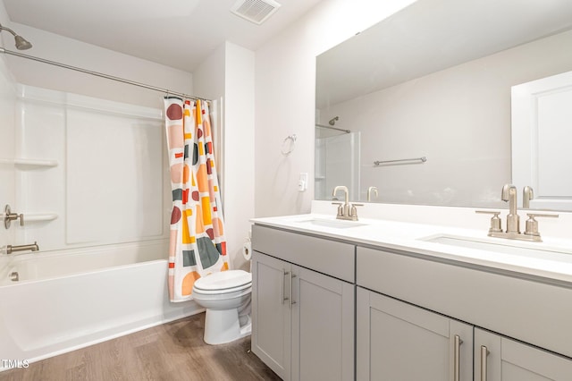 1113 Umstead Grove Way, Durham, NC 27712 - full bathroom featuring shower / tub combo with curtain, wood finished floors, and double vanity
