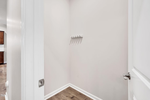 4102 Catfish Way, Durham, NC 27703 - laundry area with wood finished floors and baseboards