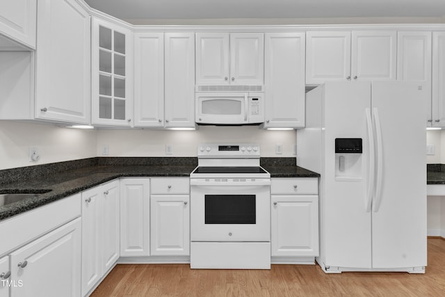 4622 Ludwell Branch Ct, Raleigh, NC 27612 - kitchen with white appliances, light wood-style flooring, white cabinets, glass insert cabinets, and dark stone countertops