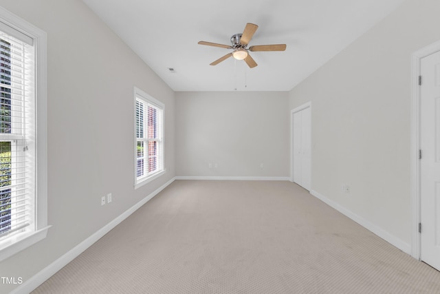 4622 Ludwell Branch Ct, Raleigh, NC 27612 - empty room featuring light carpet and a ceiling fan