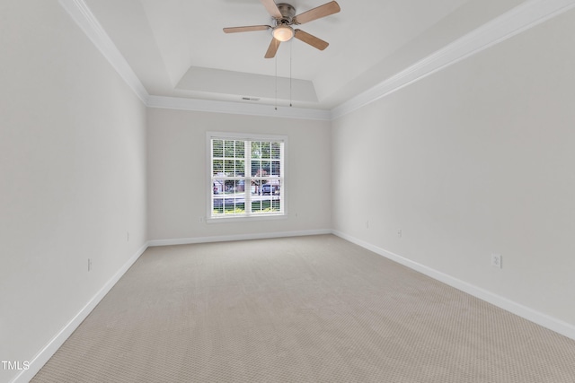 4622 Ludwell Branch Ct, Raleigh, NC 27612 - empty room with a tray ceiling, light colored carpet, a ceiling fan, and crown molding