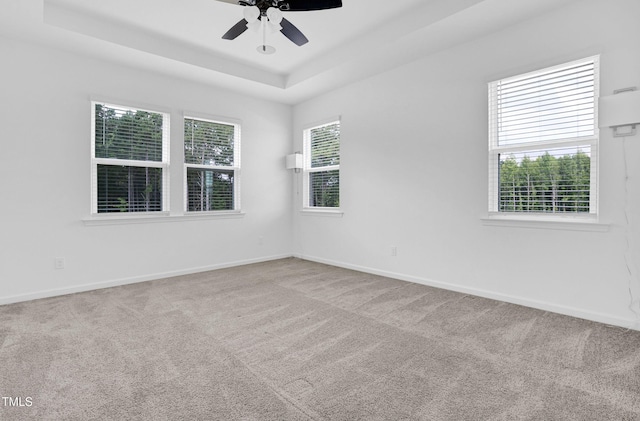 1505 Willow Landing Way, Willow Springs, NC 27592 - carpeted spare room with a ceiling fan and a tray ceiling