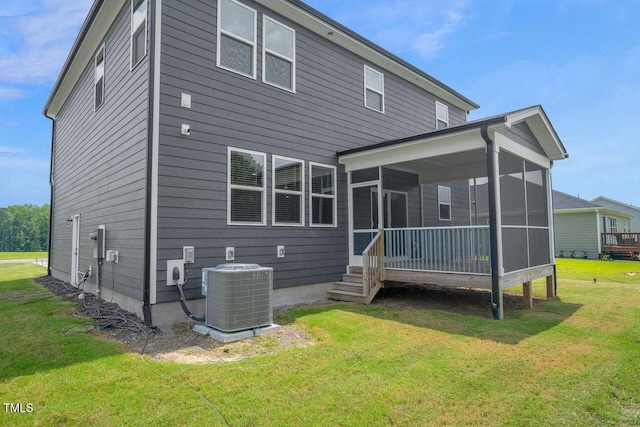 1505 Willow Landing Way, Willow Springs, NC 27592 - back of house featuring a sunroom and a lawn