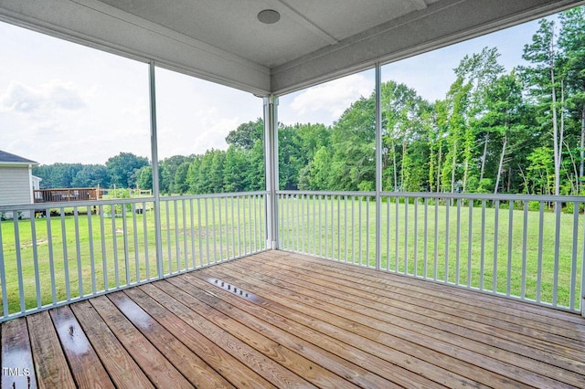 1505 Willow Landing Way, Willow Springs, NC 27592 - unfurnished sunroom featuring view of wooded area