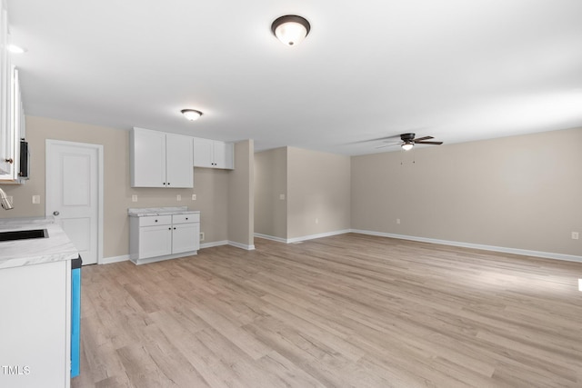 810 Williams St, Burlington, NC 27217 - unfurnished living room with a ceiling fan and light wood-style flooring