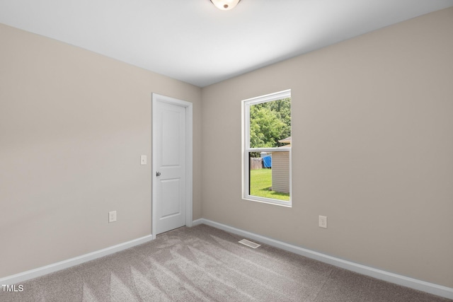 810 Williams St, Burlington, NC 27217 - carpeted spare room with baseboards