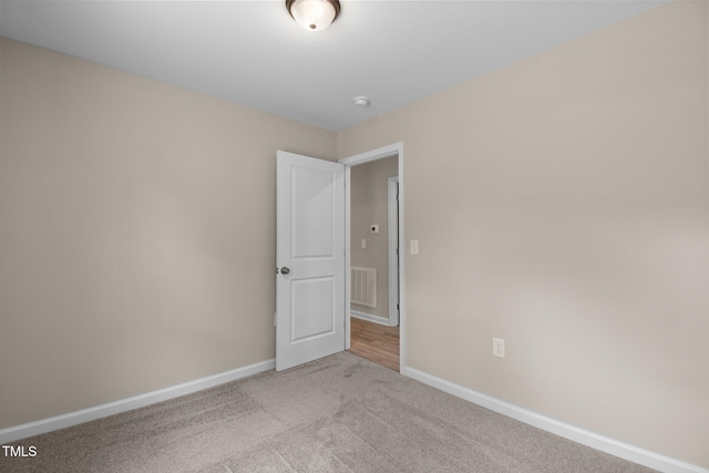 810 Williams St, Burlington, NC 27217 - empty room with carpet flooring and a smoke detector