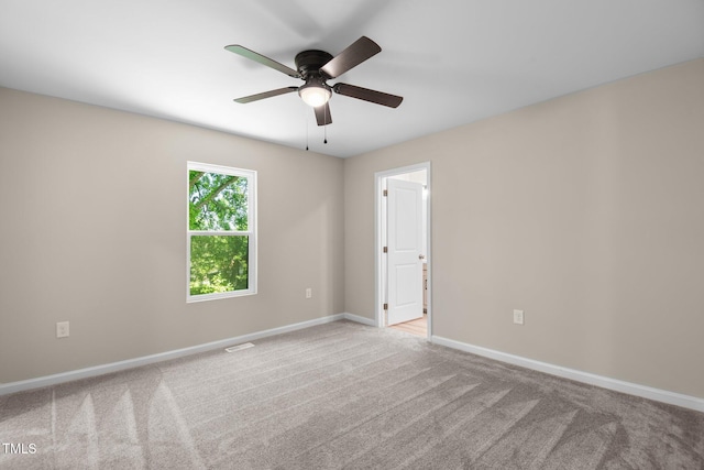 810 Williams St, Burlington, NC 27217 - unfurnished room featuring a ceiling fan and carpet