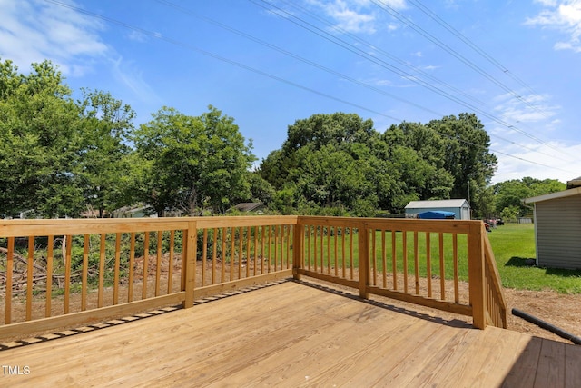 810 Williams St, Burlington, NC 27217 - wooden deck with a lawn and view of wooded area