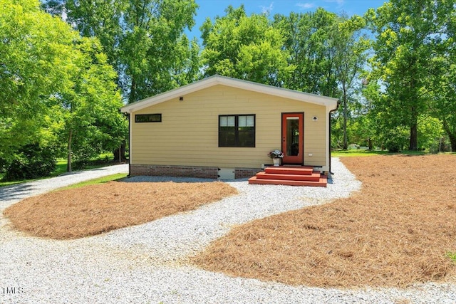 3213 Mid Pines Rd, Raleigh, NC 27606 - view of front of house featuring crawl space and view of scattered trees