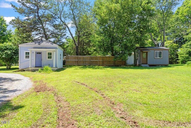 3213 Mid Pines Rd, Raleigh, NC 27606 - view of yard featuring a storage unit