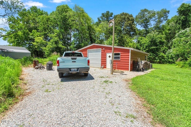 3213 Mid Pines Rd, Raleigh, NC 27606 - detached garage with gravel driveway