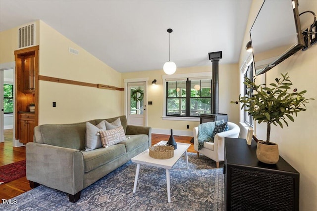 3213 Mid Pines Rd, Raleigh, NC 27606 - living area with wood finished floors and lofted ceiling