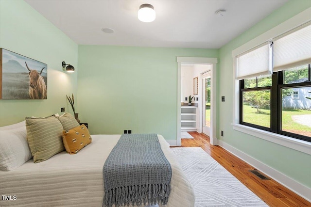 3213 Mid Pines Rd, Raleigh, NC 27606 - bedroom featuring baseboards and light wood finished floors