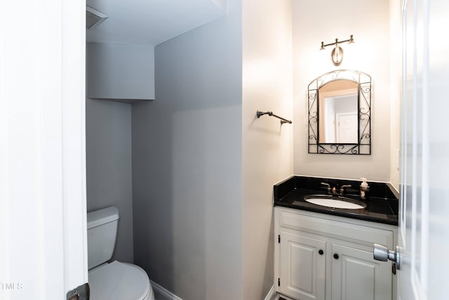 6205 Remington Lake Dr, Raleigh, NC 27616 - half bathroom with vanity and toilet