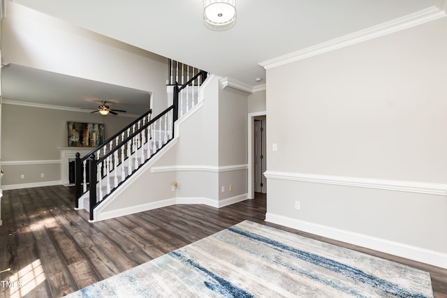 6205 Remington Lake Dr, Raleigh, NC 27616 - entrance foyer with wood finished floors, stairway, ceiling fan, and crown molding