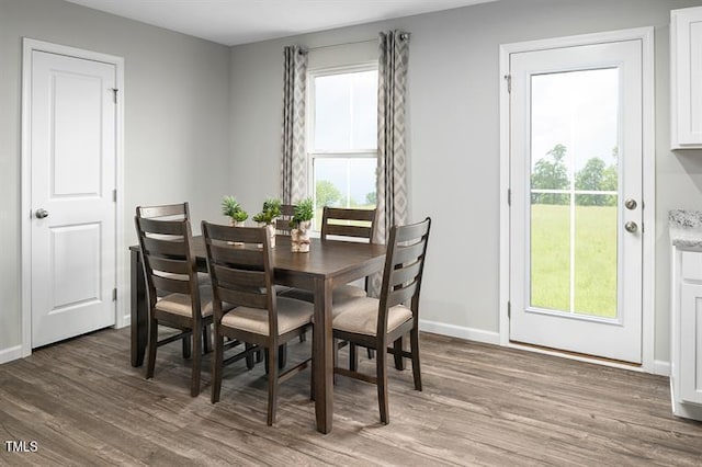 1437 Indigo Creek Dr, Zebulon, NC 27597 - dining room featuring wood finished floors and baseboards