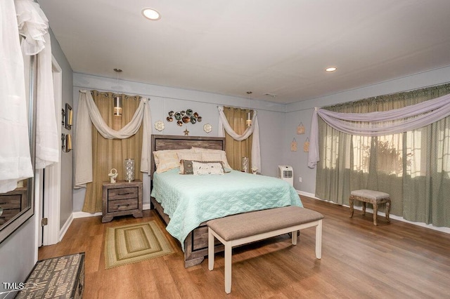 810 Grovemont Rd, Raleigh, NC 27603 - bedroom featuring wood finished floors and recessed lighting