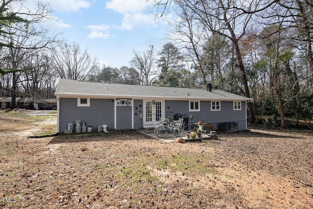 810 Grovemont Rd, Raleigh, NC 27603 - back of property featuring a patio area and french doors