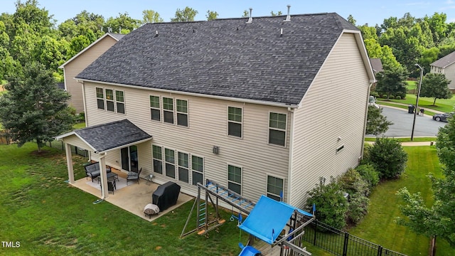 184 Elgin Ct, Burlington, NC 27215 - back of property featuring a patio area and a shingled roof