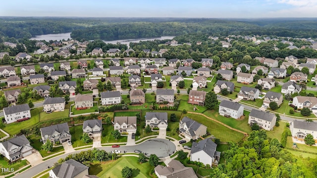 184 Elgin Ct, Burlington, NC 27215 - aerial view of residential area featuring a large body of water and a heavily wooded area