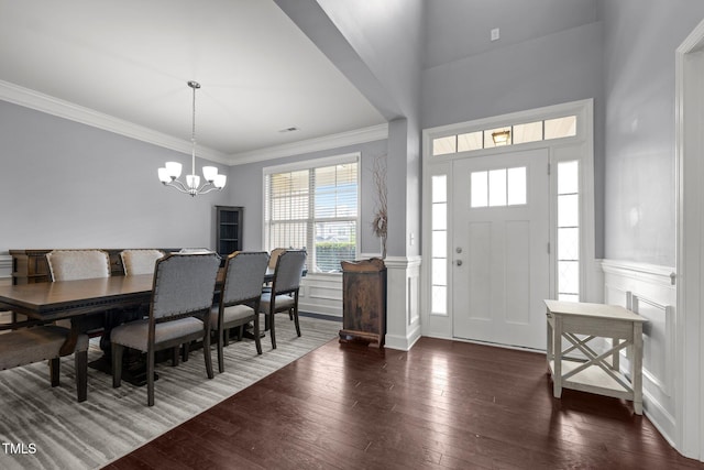 184 Elgin Ct, Burlington, NC 27215 - entryway with hardwood / wood-style flooring, a decorative wall, a chandelier, ornamental molding, and wainscoting