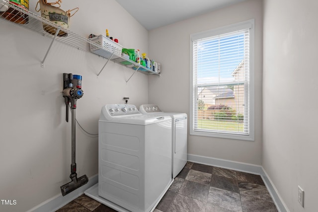 184 Elgin Ct, Burlington, NC 27215 - washroom featuring separate washer and dryer, healthy amount of natural light, and dark stone finish flooring