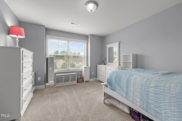 184 Elgin Ct, Burlington, NC 27215 - bedroom featuring light carpet and baseboards