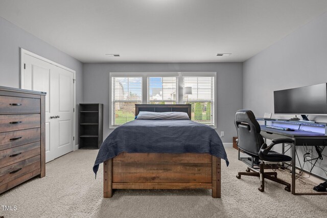 184 Elgin Ct, Burlington, NC 27215 - bedroom featuring light carpet and a desk