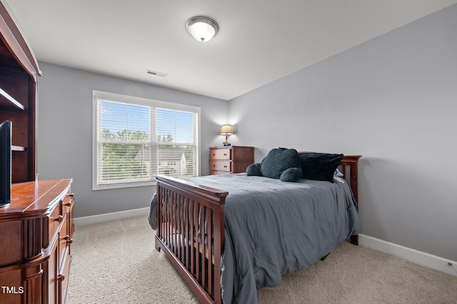 184 Elgin Ct, Burlington, NC 27215 - bedroom featuring baseboards and light colored carpet
