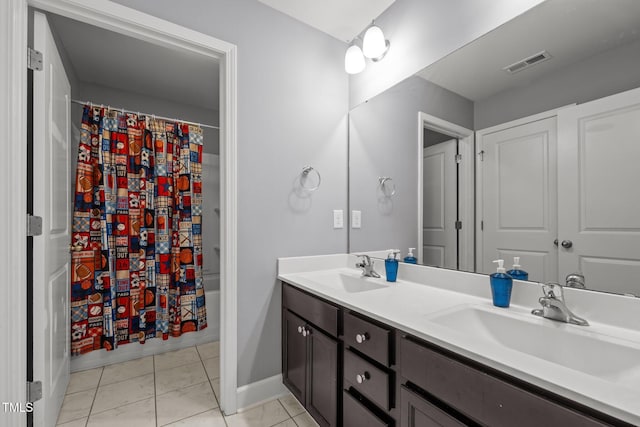 184 Elgin Ct, Burlington, NC 27215 - bathroom featuring double vanity and shower / bath combination with curtain