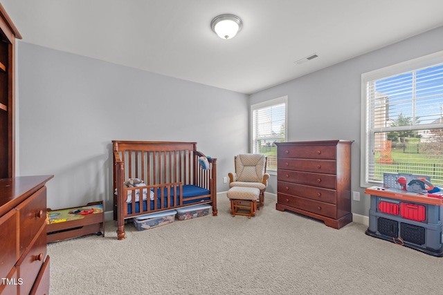 184 Elgin Ct, Burlington, NC 27215 - bedroom with carpet and a nursery area