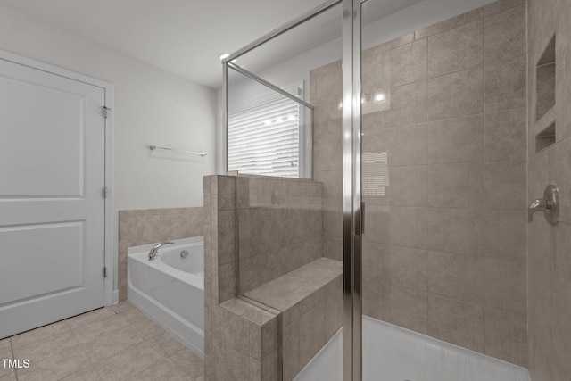 184 Elgin Ct, Burlington, NC 27215 - full bathroom with a stall shower, a bath, and tile patterned floors