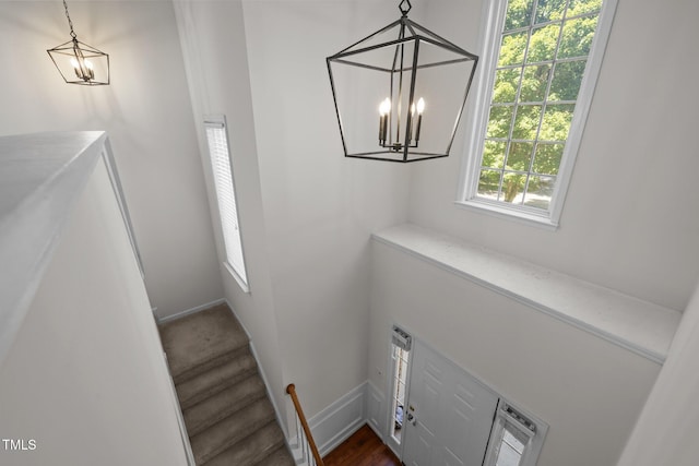 110 Bonhill Ct, Apex, NC 27502 - stairway featuring a chandelier