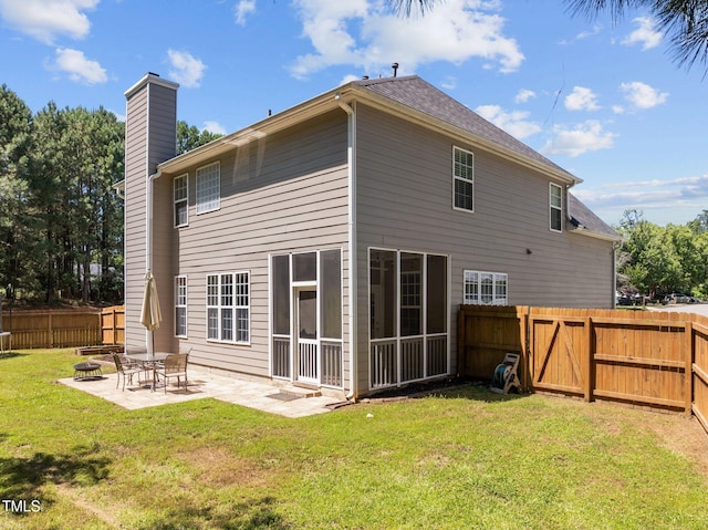 110 Bonhill Ct, Apex, NC 27502 - rear view of property featuring a chimney, a fenced backyard, a patio, and a fire pit